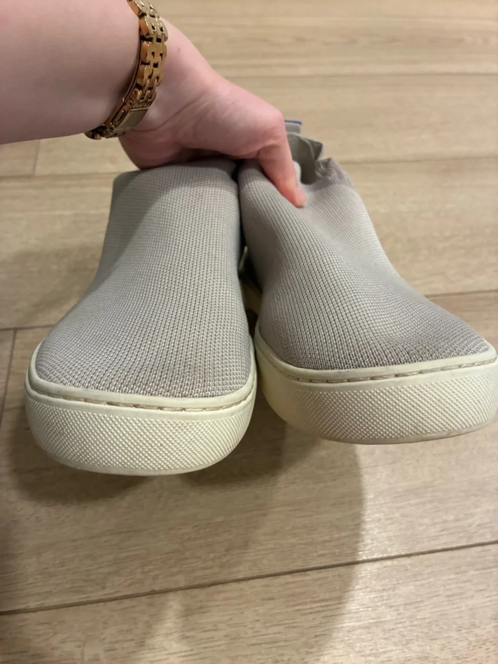 Rothy's Slip-On Sneakers in Light Taupe with Blue Pull Tab